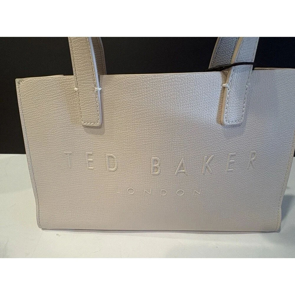Ted Baker Icon small tote bag in a cream-colored, structured material.